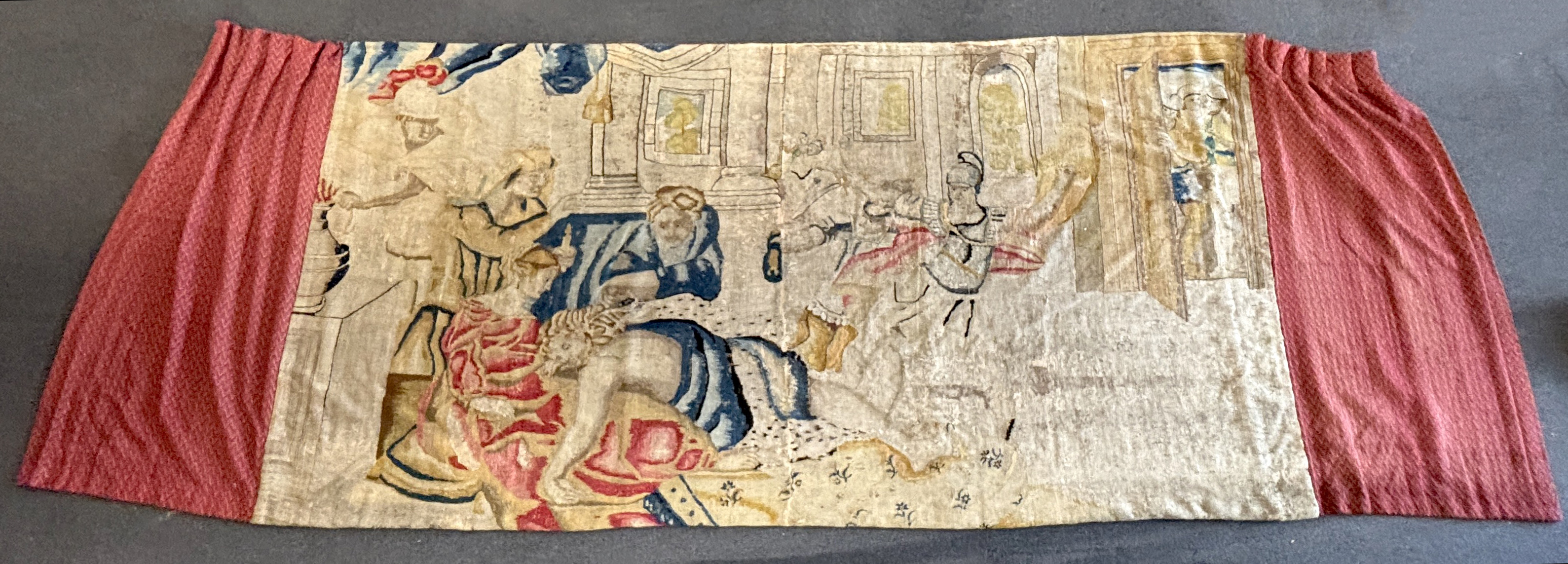 A large mid 17th century Flemish tapestry (possibly Antwerp) depicting Samson sleeping in the lap of Delilah while one of the Philistines is cutting off his locks, after the painting by Rubens. Cut in half, then re joine